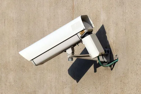 CCTV security camera mounted on a wall